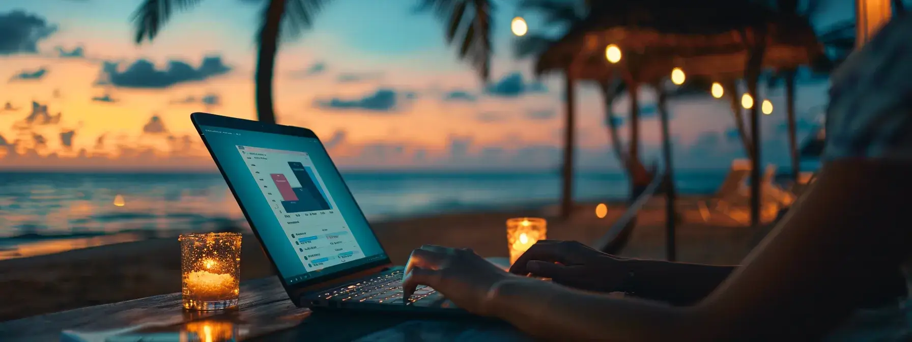 a person analyzing a website's seo performance on a laptop with beach scenery in the background.